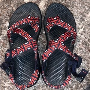 Navy blue and red chacos